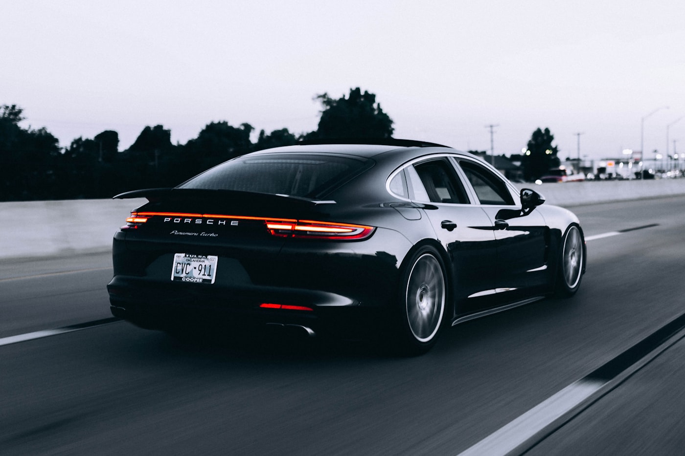 A premium driving experience captured at golden hour — sleek lines, refined craftsmanship, the spirit of a perfectly matched policy